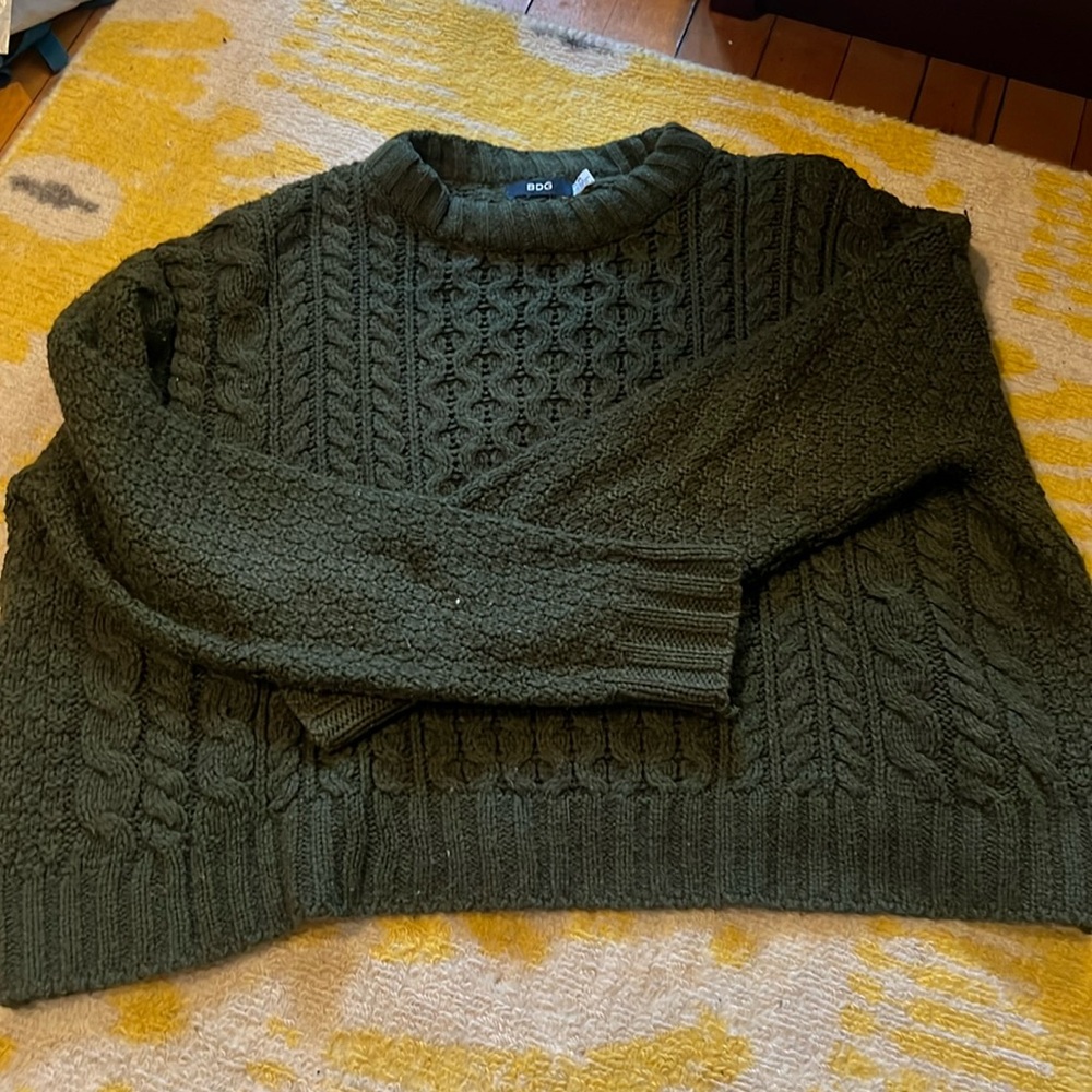 green crew neck sweater